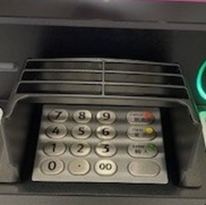 Cover the ATM keypad with your hand